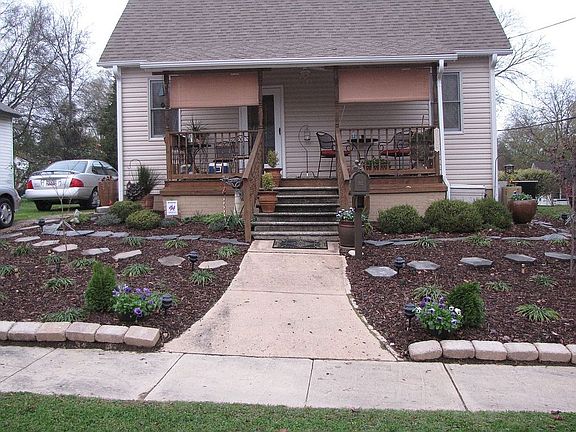 front of home with landscaping~