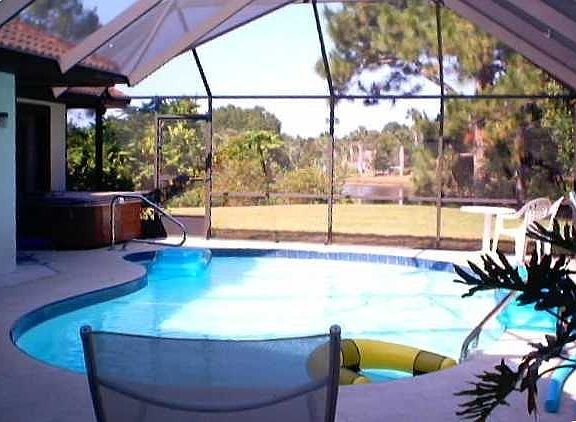 Screened pool facing lake