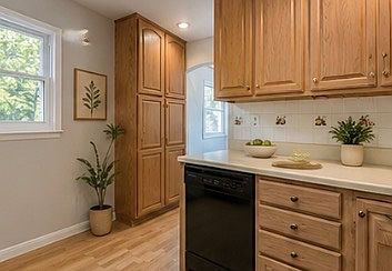 Large pantry and abundant cabinet and storage space.