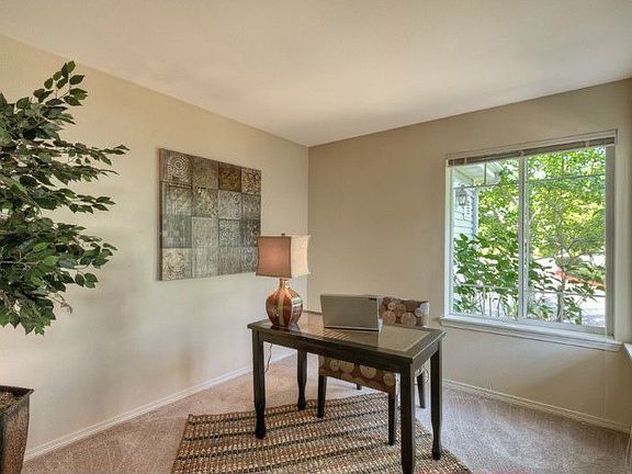 Den or office area on main floor, with plenty of natural light.