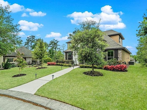This home is gorgeous, 2765 sq. ft. with every inch of space efficiently utilized. Outdoor lighting, beautiful trees, azaleas! Operable outdoor shutters!
