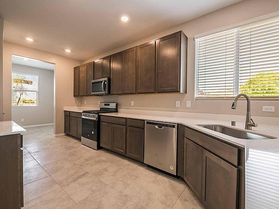 4th image of 7489 Lush Oasis Ave
