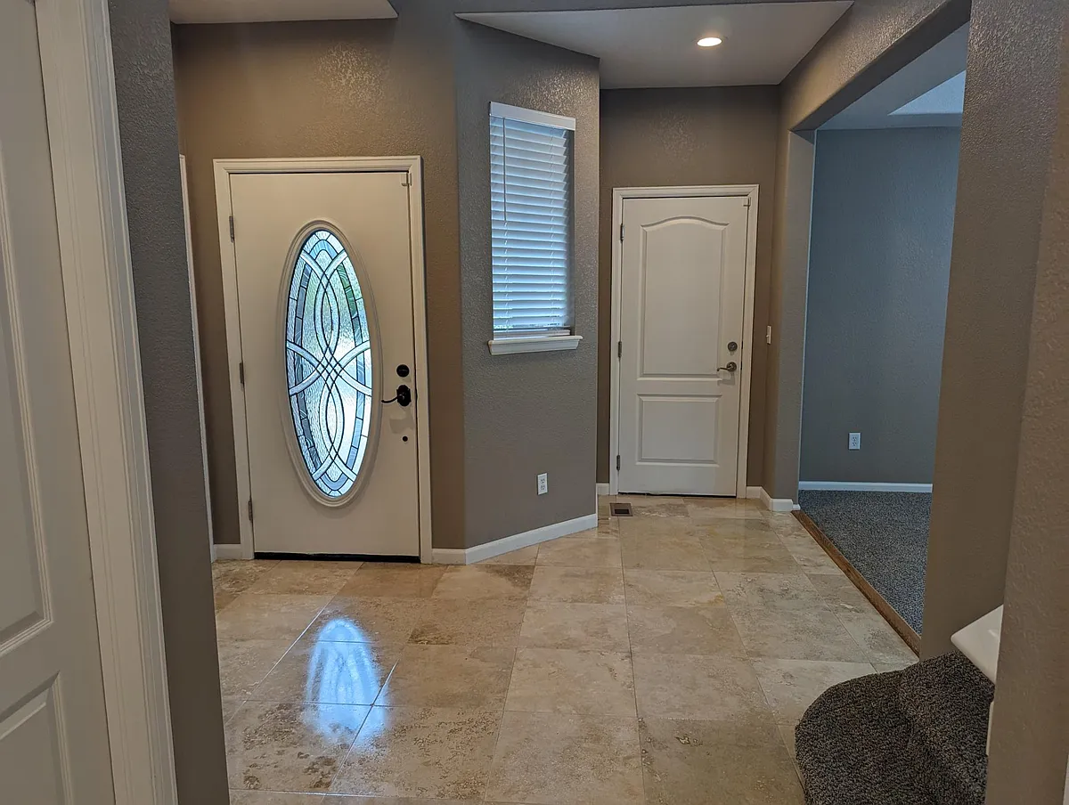 Front entrance area. - 9660 Ouray St
