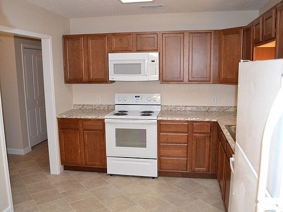 Kitchen with new wood cabinets/countertops