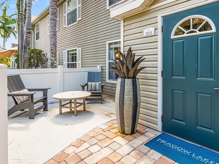 Relax on your private patio for a breath of fresh air and secluded relaxation.