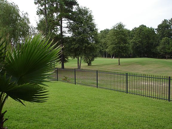 View of the fairway to the left. Note the wooded area - lots of privacy.