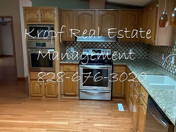 Kitchen with granite counter tops and stainless steel appliances