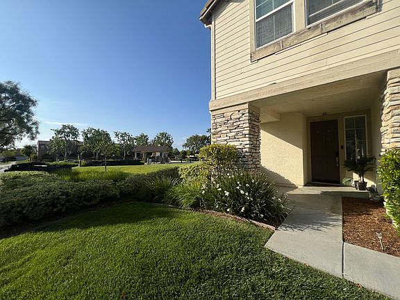 Park next to House Entrance