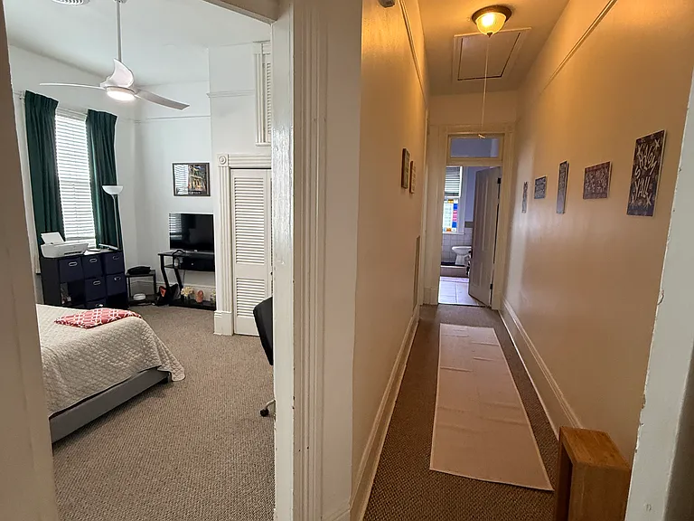 Hallway back to bedrooms and bathroom