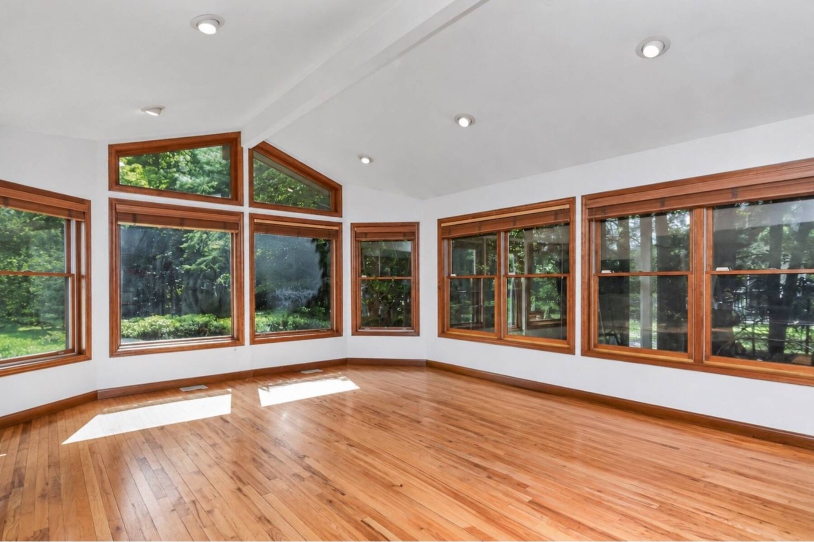  Sunlit living room with garden views
