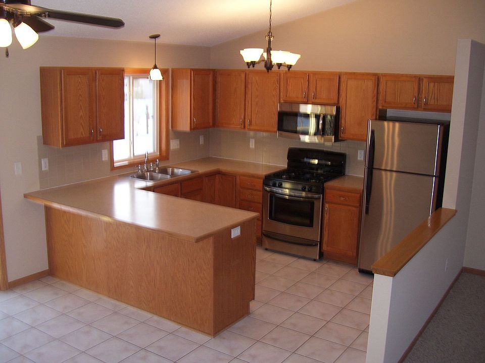 New appliances and fixtures compliment the open kitchen.