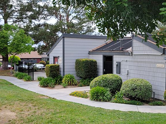 Walkway around the office and laundry room at Dove Ridge Apartments.
