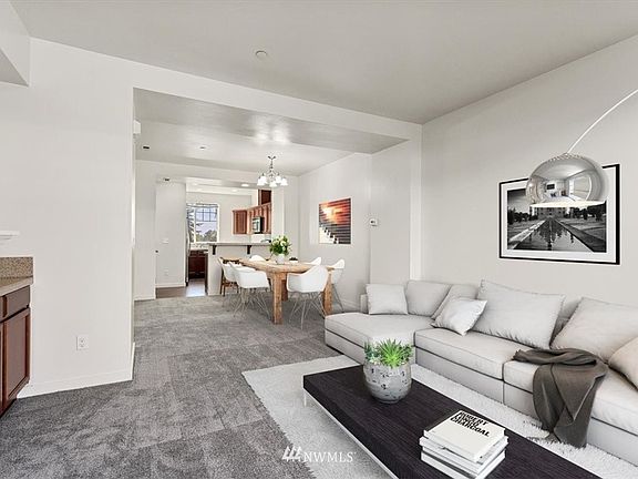 **Photos are not of actual unit but are of neighboring unit. Same floor plan. Colors may vary.**