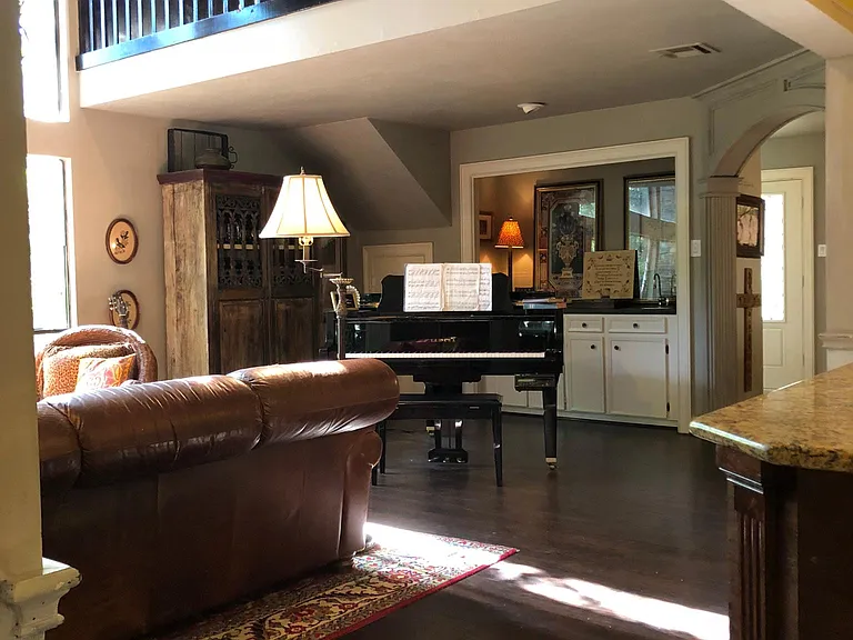 View from Breakfast room into the Living Room and Upstairs F
