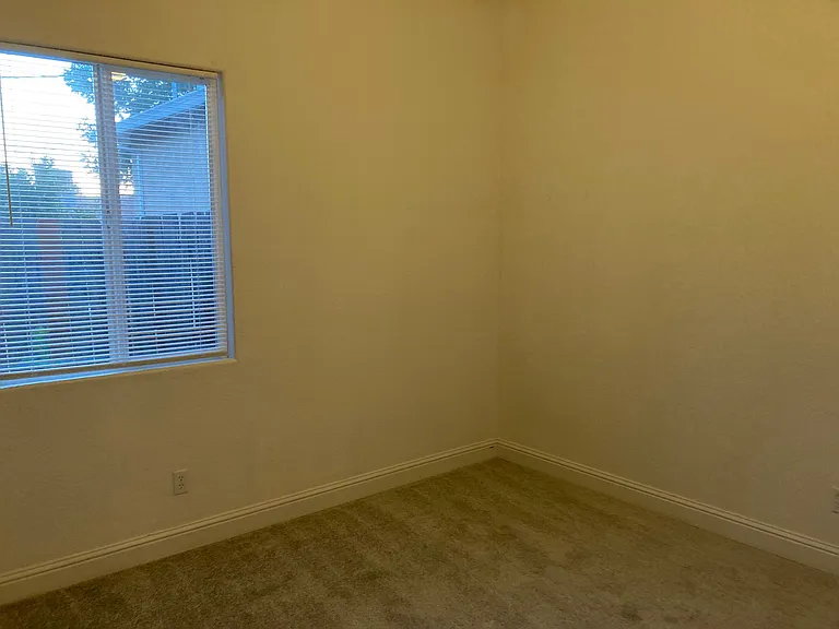 Bedroom with Backyard View