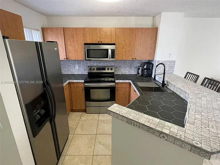 8750 N Sherman Cir #208 — Photo 4