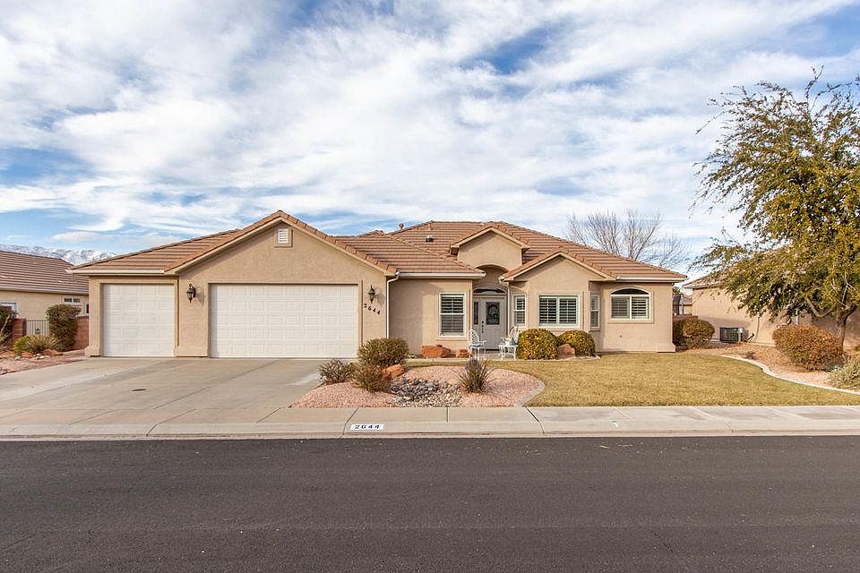 1 Story. Spacious 3 car garage with loads of cabinets.