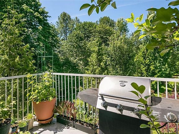 Balcony overlooking a trail and beautiful wooded area