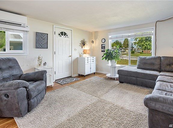 Living room with hard woods floors.