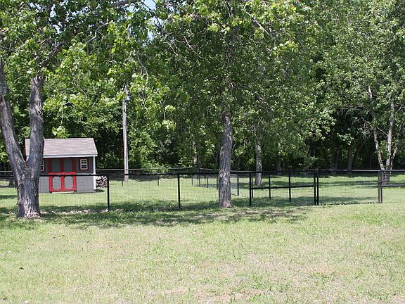 Back yard view of storage.