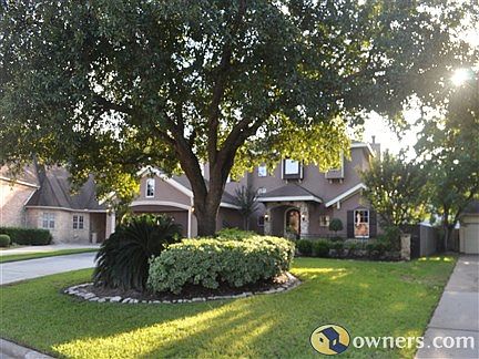 Large manicured front yard