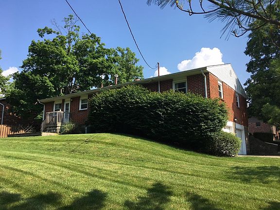 The rear exterior photo shows the 2 level deck.