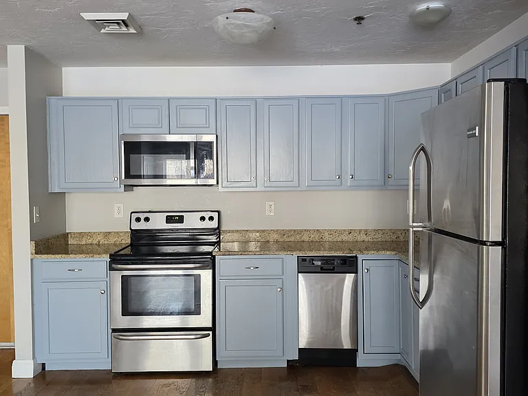 Renovated kitchen with stainless steel appliances