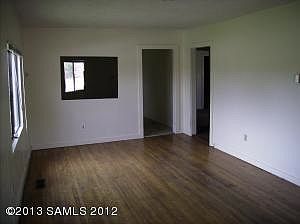 Hardwood floors and ceiling fans throughout