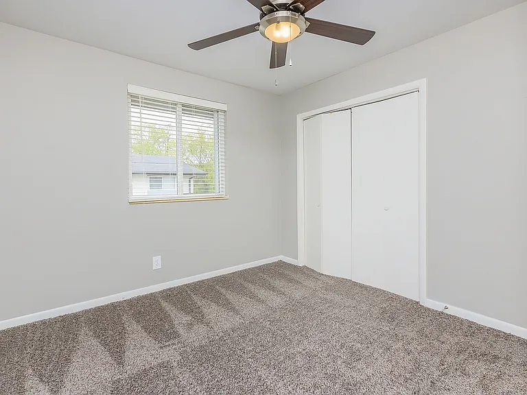 Bedroom with carpet