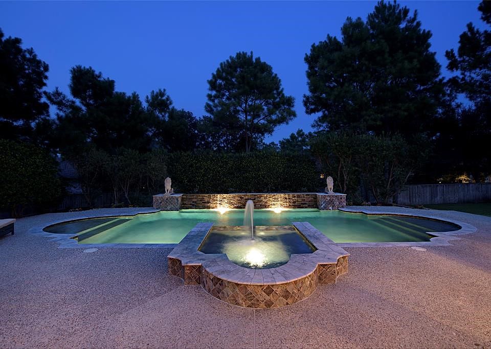 Beautiful, luxury Rueby custom home located in the popular Seasons Trace area of Sterling Ridge Village in The Woodlands.