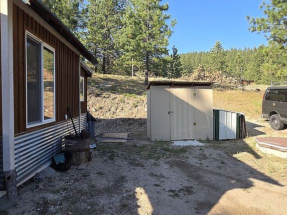 Side of cabin, shed, goat sh
