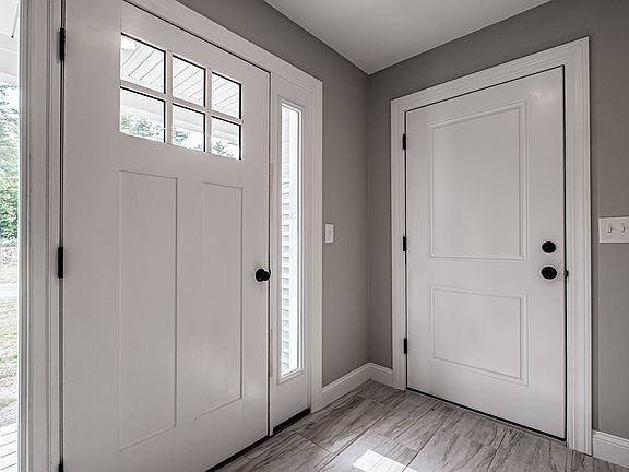front entry hall and door to garage