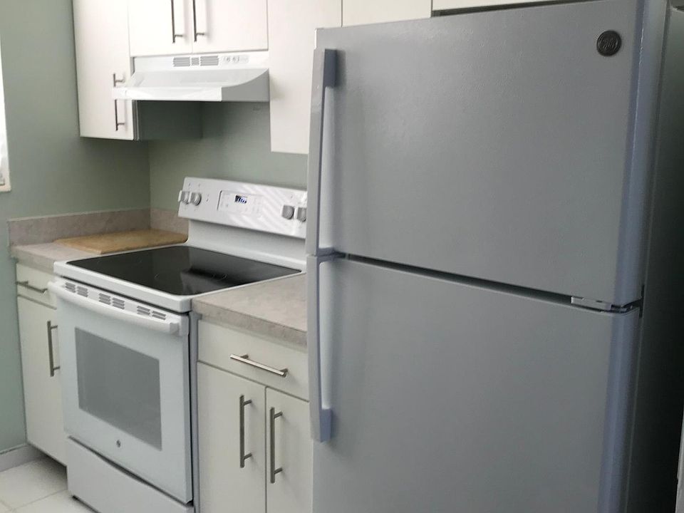 All new kitchen appliances and cabinet doors