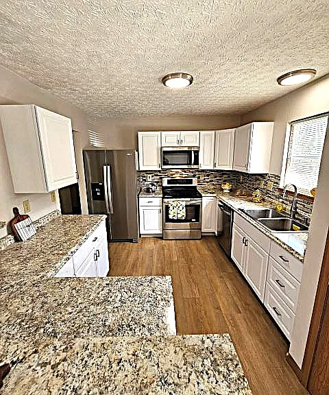 Appliances: refrigerator, stove, microwave, dishwasher