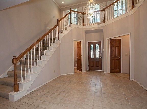 Grand entry with high ceilings