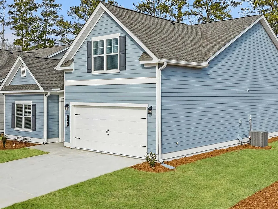 Exterior of the Wakefield, two story home with a private driveway and attached garage.