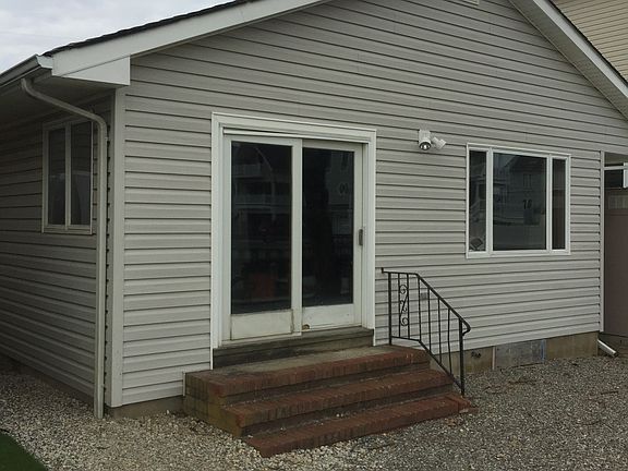 Back entrance facing creek