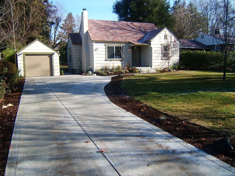 view of house and front yard from street