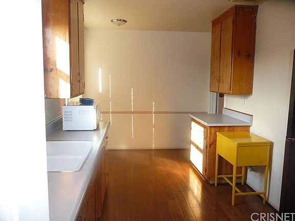5th image of 9807 Roslyndale Ave
