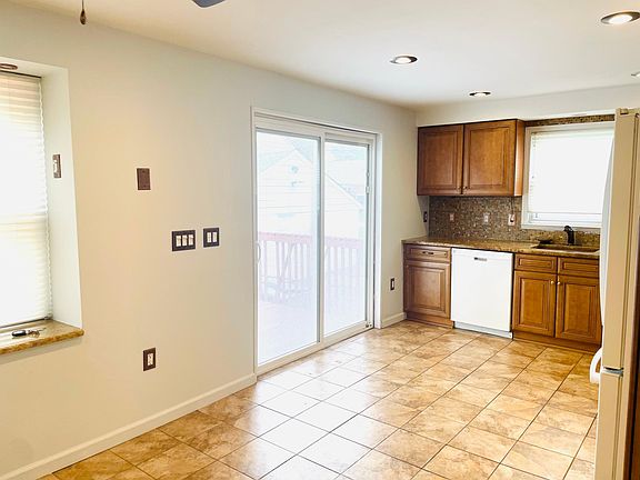 Kitchen with sliding door to deck