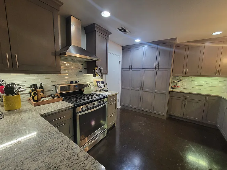Kitchen looking to garage entry