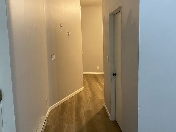 Hallway to living room and office