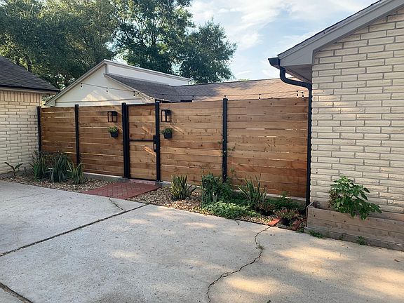 Private locked gate with garden
