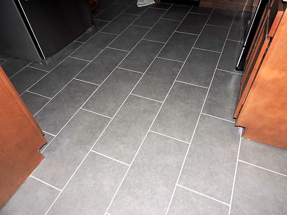 Tile floors at entryway, kitchen, bathroom and laundry room