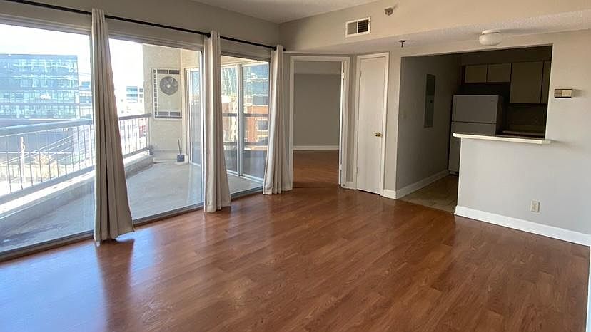Living Room, Balcony, kitchen and peep in bedroom