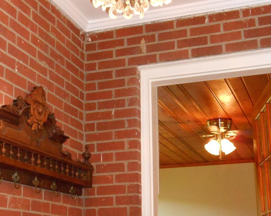 Mudroom with original Chandelier