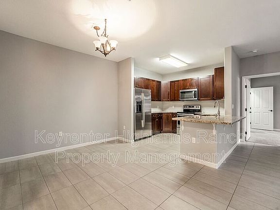 4th image of 8496 S Hoyt Way Unit 103