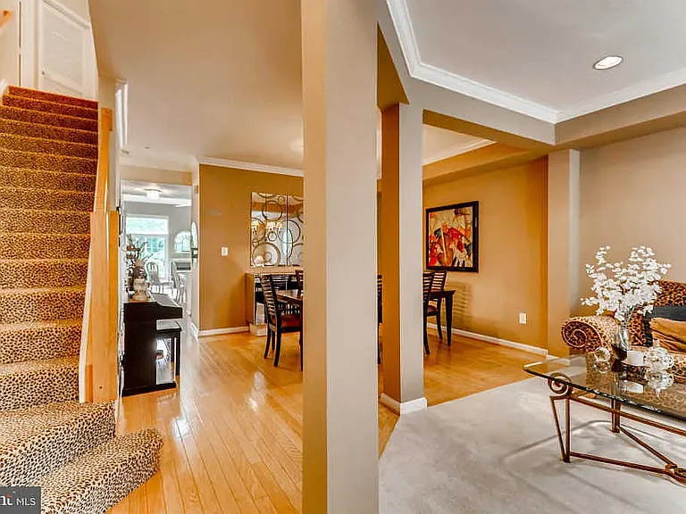 Living Room, as you enter Front Door/Foyer, walking up stairs to 2nd Floor, No.3
