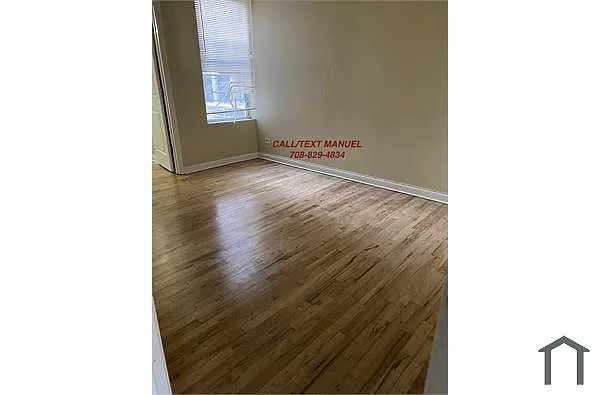 Building Photo - 1318 S Kildare Ave #1