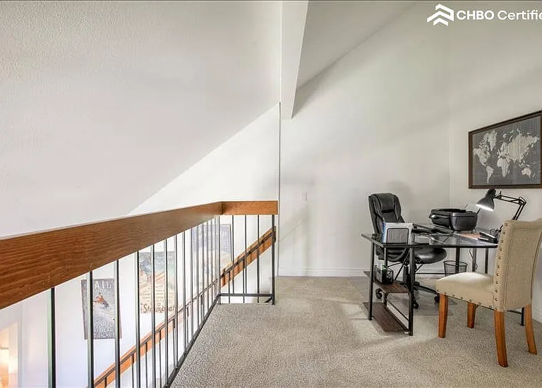 Loft area with working office and air printer